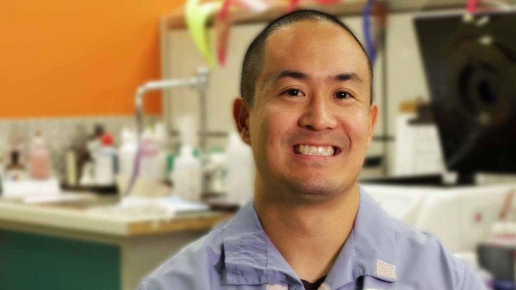 James Magata, Diagnostic Laboratory Services team member, featured in a career story inside a laboratory setting